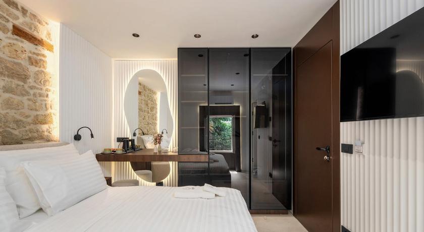 Foto Una Rooms - Booking Diskon Spesial