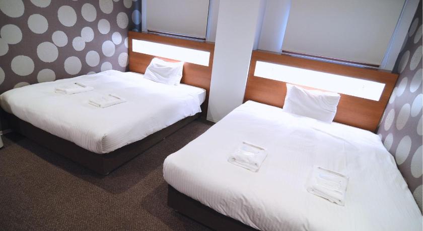 Image of Standard Double Room with Two Double Beds 0