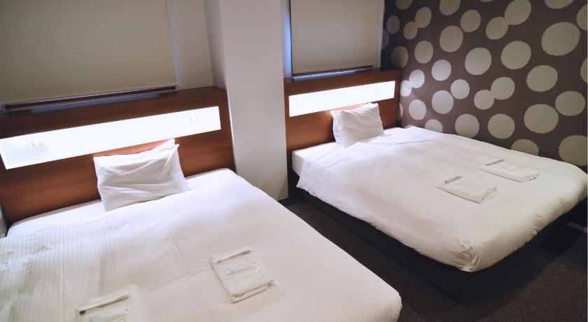 Image of Standard Double Room with Two Double Beds 1