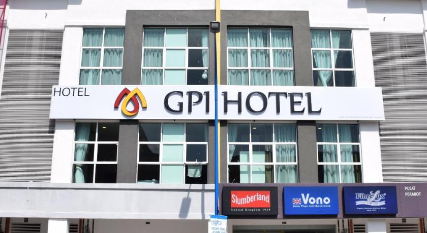 a large building with a sign on the side of it, GPI Hotel in Bentong
