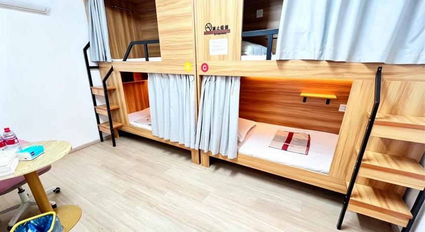 Image of Quadruple Room with Shared Bathroom 0