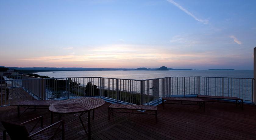 a view from a balcony overlooking the ocean, Hotel Uohan in Karatsu