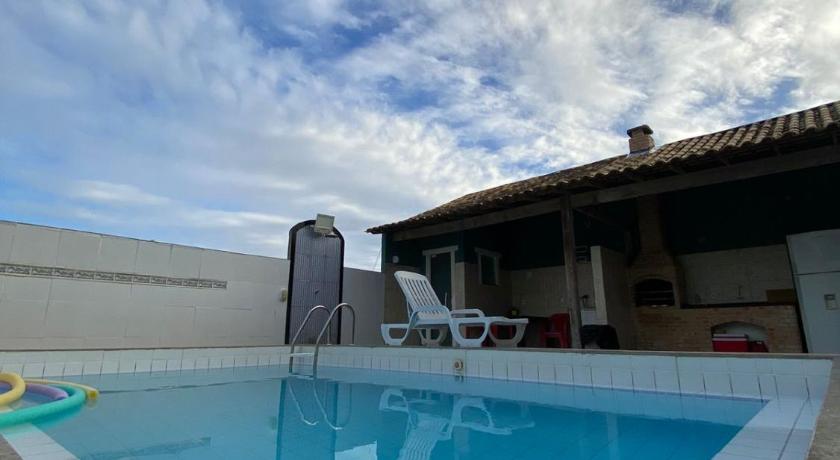 Foto de Casa c ar cond, wifi, a 5 min Orla da Lagoa Para Famílias - Reserva con descuento Agoda