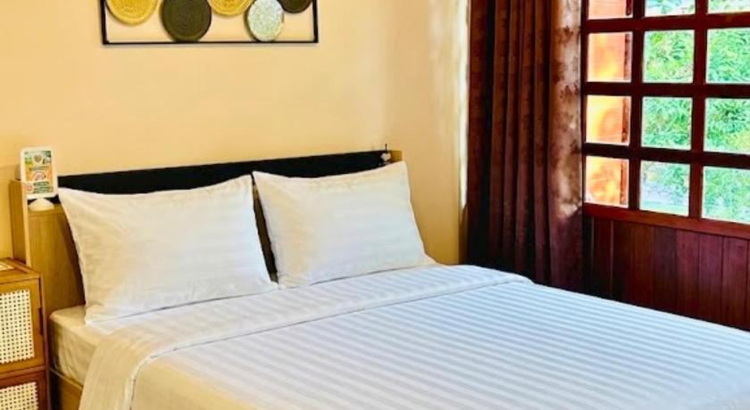 รูปของห้องพักเตียงควีนไซส์ มีระเบียง (Queen Bed with Patio Room) 11