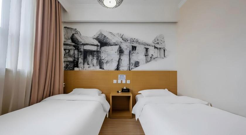 Image of Superior Tweepersoonskamer met 2 Aparte Bedden en Gratis Koffie (Superior Twin Room with Free Coffee) 1