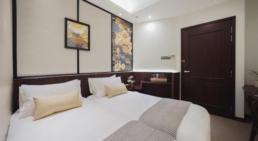 Image of Classic Twin Room - No Window 7