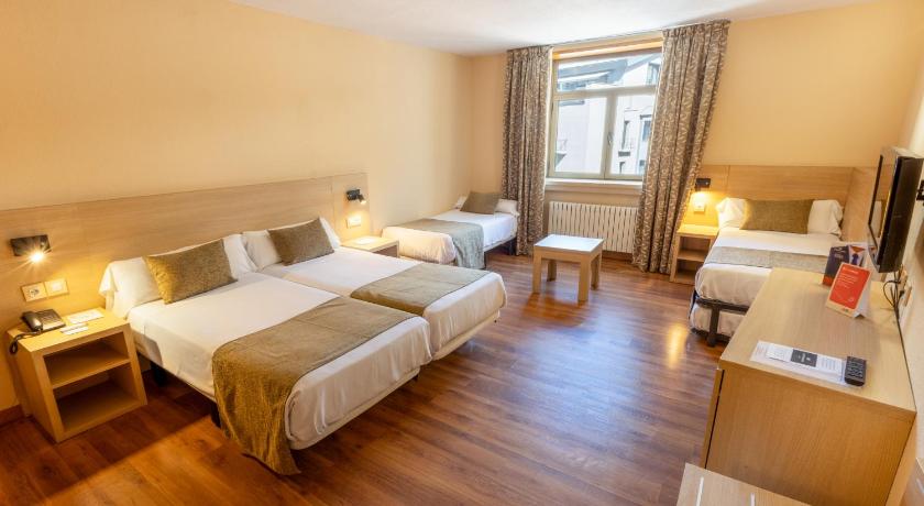 Image of Quadruple Room with Mountain View and Spa Access 1