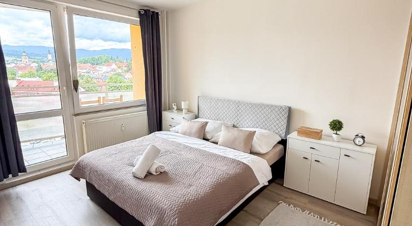 Photo de Simcity I Views apt with balcony, EV charger, Gym and grocery stores near by 5 min walk to city cent - Réservation à prix Agoda