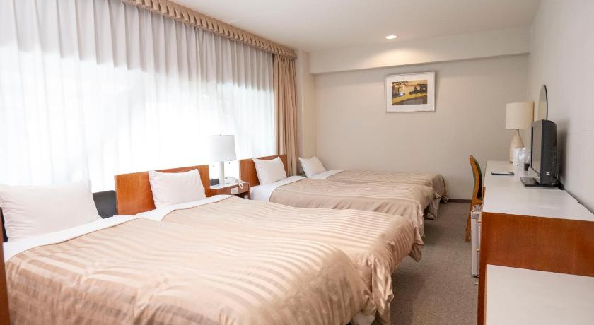 Image of Quadruple Room with Private Bathroom 1