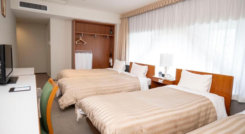 Image of Quadruple Room with Private Bathroom 0