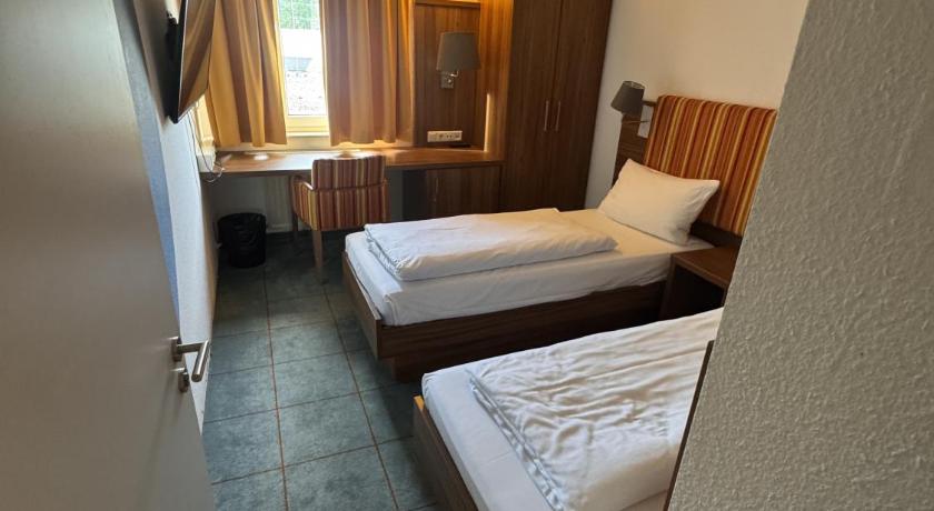 Image of Superior Family Room with One Double Bed, One Single Bed and Sofa Bed 4