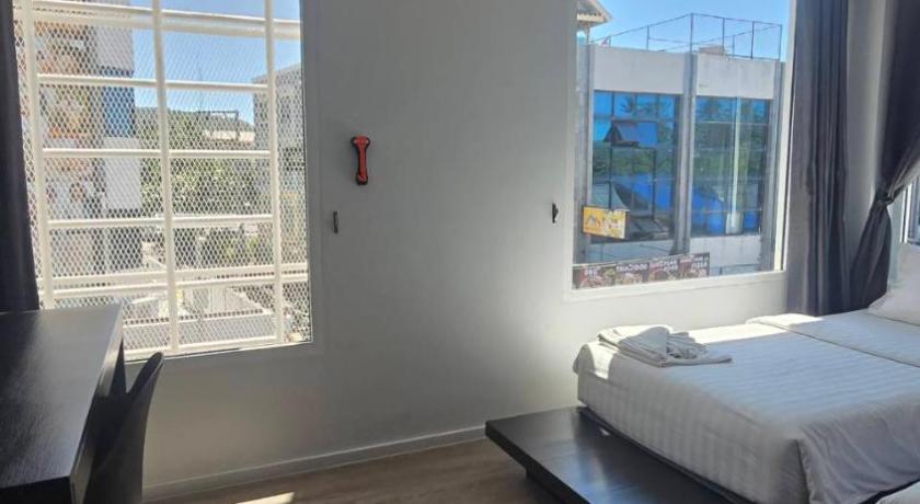 Image of Triple Room with Private Bathroom 9