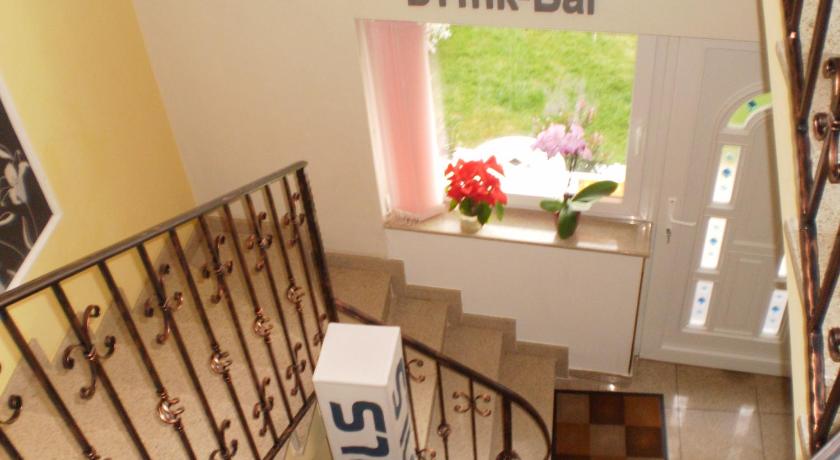 a stair case with a picture of a dog on it, Mosoly Apartman in Szeged