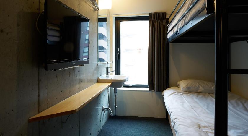 Image of Twin Room Shared Bathroom 0