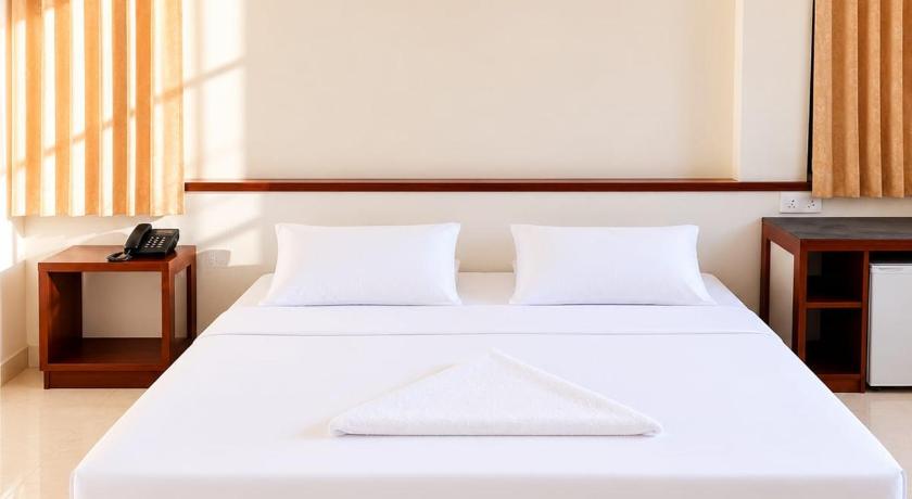 รูปของห้องมาตรฐาน เตียงใหญ่หรือเตียงแฝด (Standard Double or Twin Room) 1