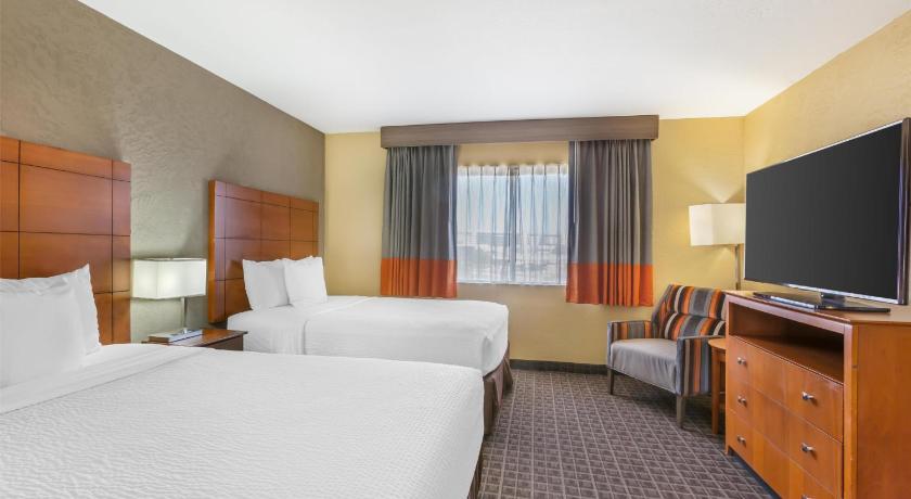Image of Suite - 2 Double Beds, Nonsmoking, Oversized Room, Separate Bedroom, Sofabed 1
