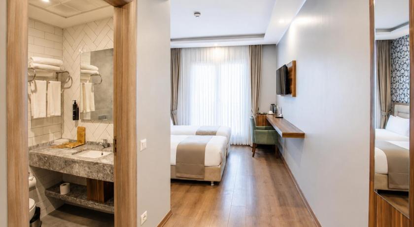 Image of Trendy Room with 2 Single Beds 1