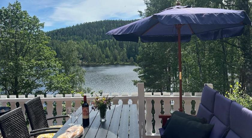 Foto de hytte ved innsjø - Reserva con descuento Agoda