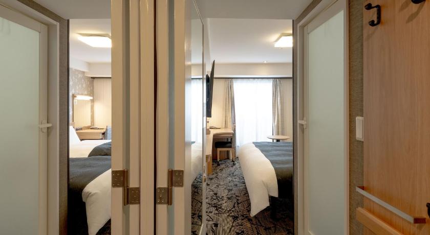 Image of Connecting Double and Twin Room - Non-Smoking 0