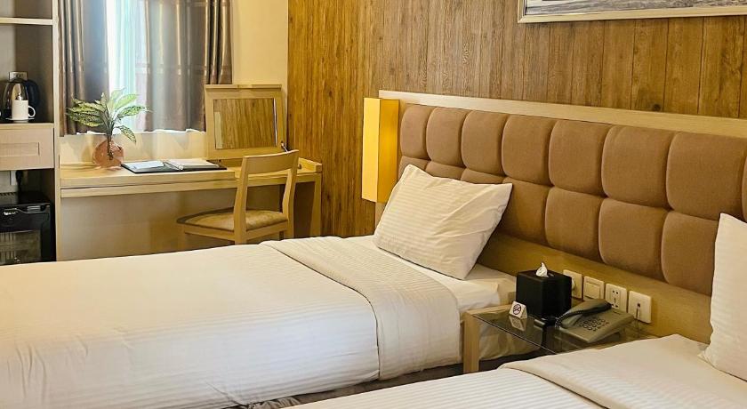 豪華房(兩床) - 有窗戶 (Deluxe Twin Room With Window)的照片 1