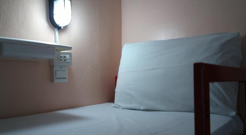 Image of Bed in Dormitory Room with Air Conditioning 10