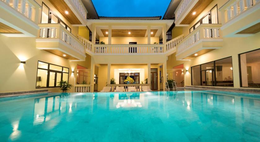 a large swimming pool in a hotel room, Calla Villa Hoi An in Hoi An