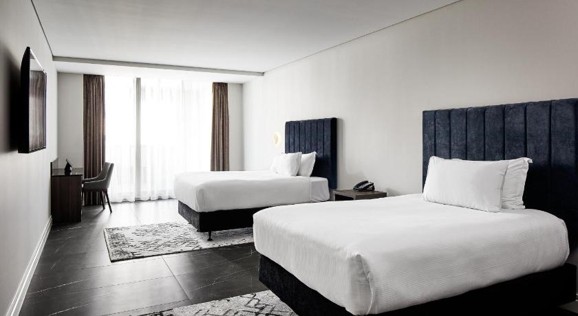 Image of 2 Double Beds Premium Park View 0