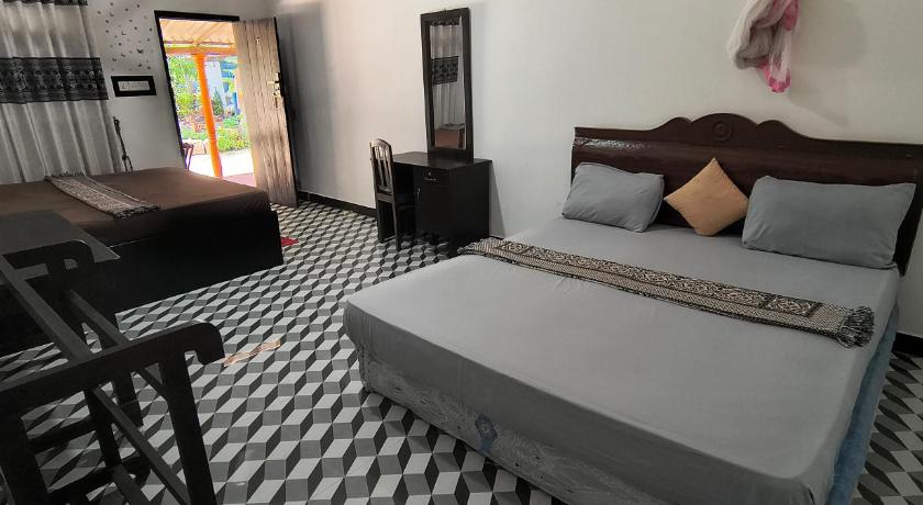Nilaveli Beach Rooms - image 9