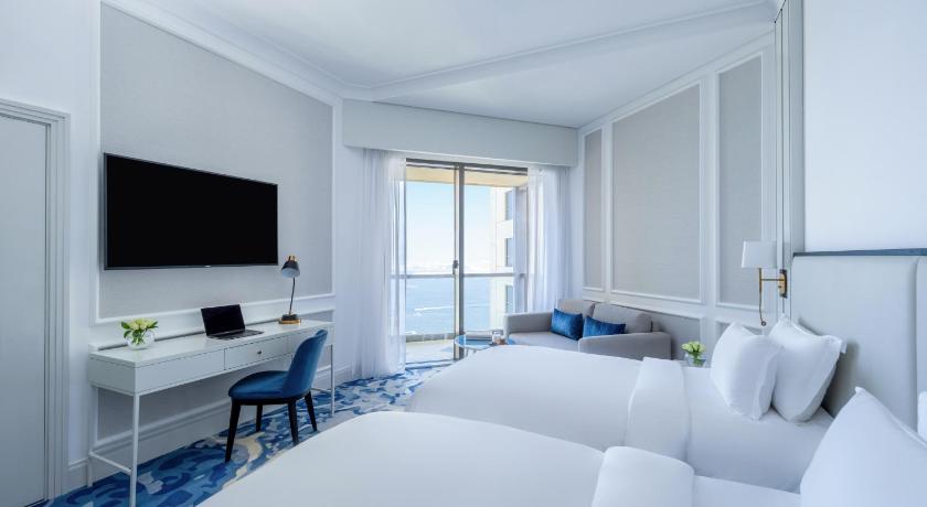 Image of Family room - Two interconnecting rooms with Balcony, Partial Seaview, 1 King Bed, 2 Single Beds 1