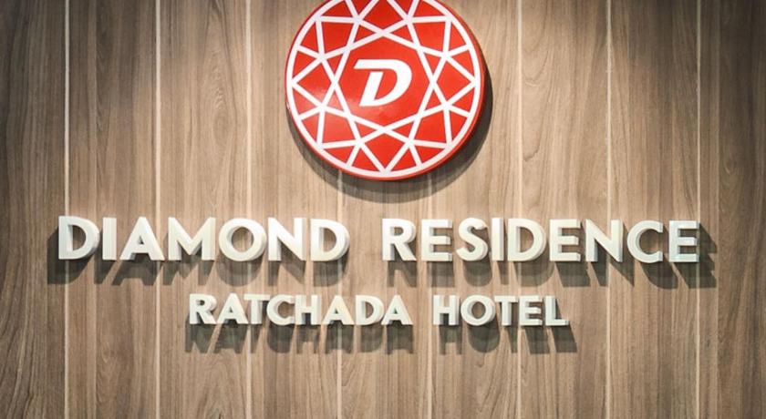 a sign that is on the side of a building, Diamond Residence Ratchada in Bangkok