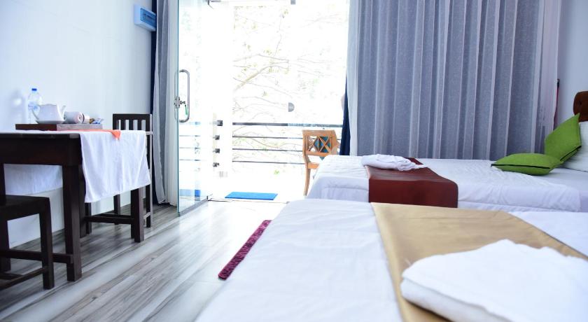 Imagen de Habitación Cuádruple con vistas al mar (Quadruple Room with Sea View) 5