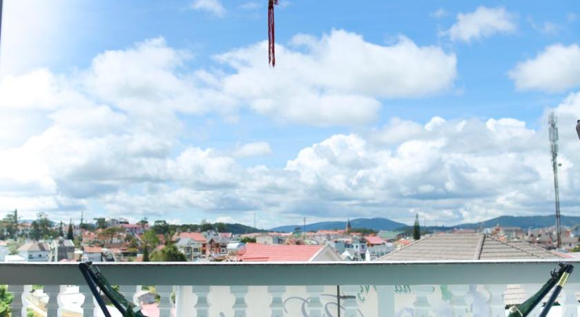 a kite being flown over a bridge, Pensee Guesthouse in Dalat
