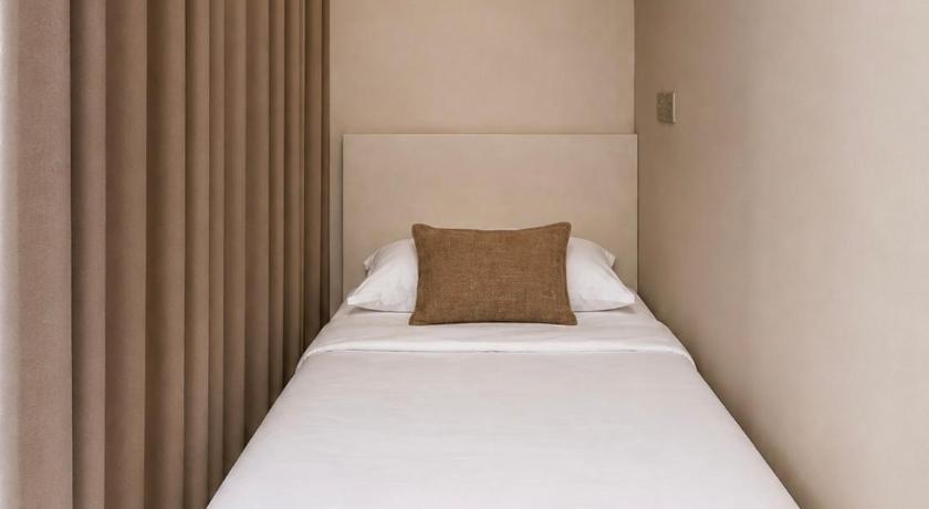 Image of Single Bed in Female Dormitory Room 0
