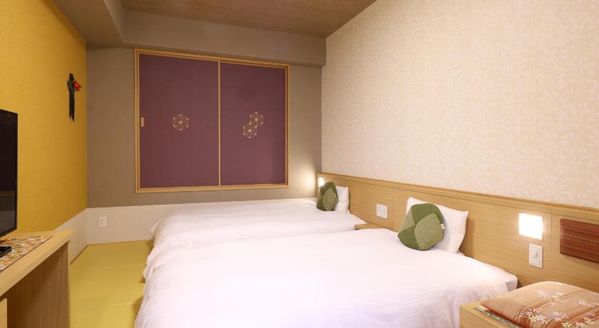 Image of Twin Room with No View - Non-Smoking (Without Cleaning Service) 0