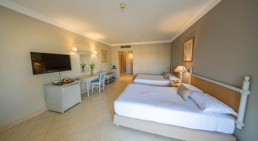 Image of Triple Room with Garden View 1