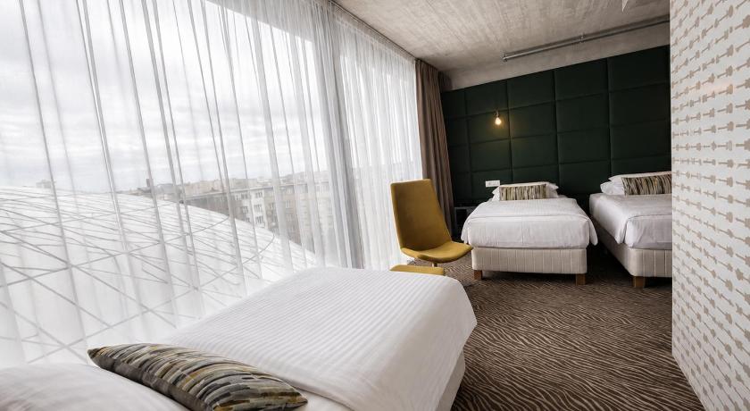 รูปของห้องคอมฟอร์ทสำหรับสามท่านพร้อมห้องอาบน้ำฝักบัว (Comfort Triple Room with Shower) 0