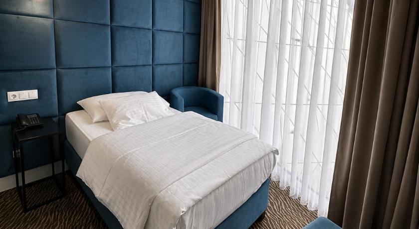 รูปของห้องเตียงเดี่ยวพร้อมห้องน้ำส่วนตัว (Single Room with Private Bathroom) 1