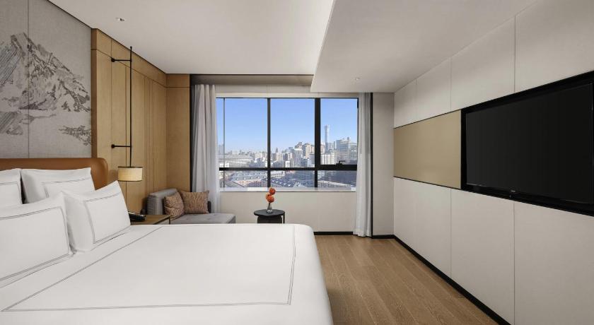 Zdjęcie: Swiss Grand Executive Room with King-size bed, Lounge Access, and City View 0