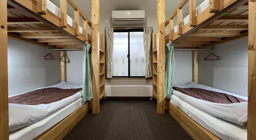 Image of Quadruple Room with Shared Bathroom 0