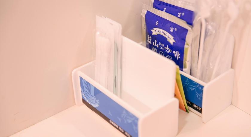 a box of toothbrushes sitting on top of a counter, Duke Business Hotel in Taoyuan