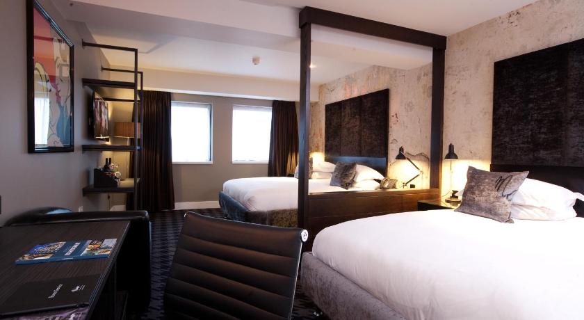 Bild av Tvåbäddsrum Club Deluxe med 2 dubbelsängar (Club Deluxe Double Double) 3