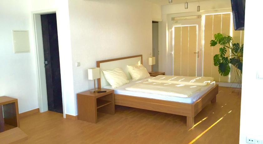 Image of Double Room with French Balcony - 10 14