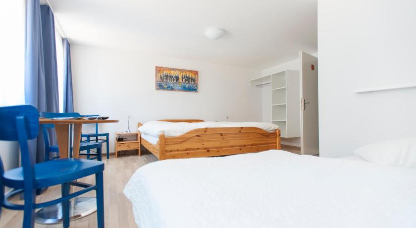 Image of Triple Room with Private Bathroom 0
