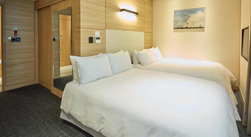 Image of 2 Separate Bedrooms on Ground Level Including One Bathroom 0