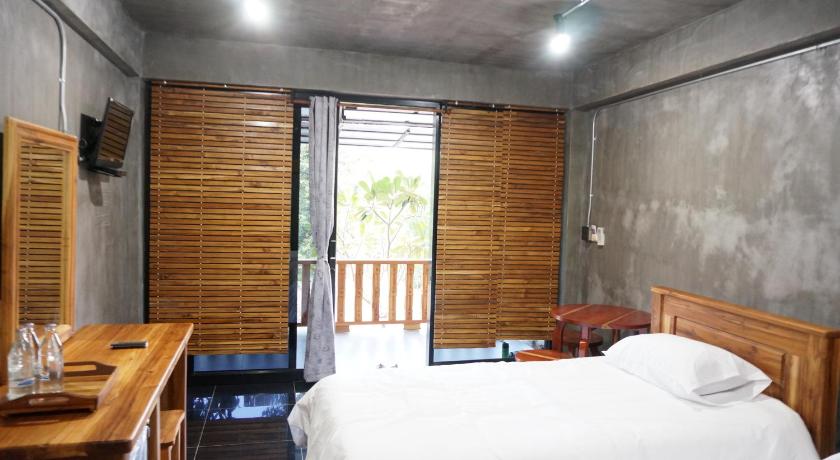 รูปของดีลักซ์ สำหรับ 3 คน (Deluxe Triple Room) 8