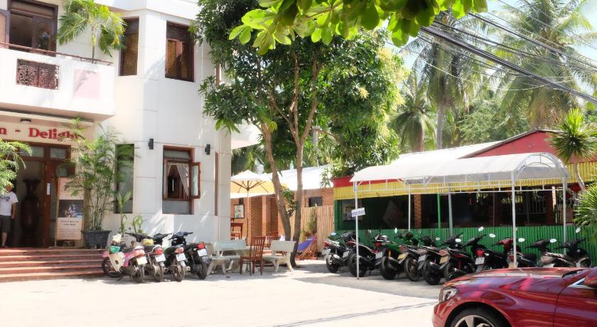 motorcycles parked in front of a restaurant, Delight Hotel Mui Ne in Phan Thiet