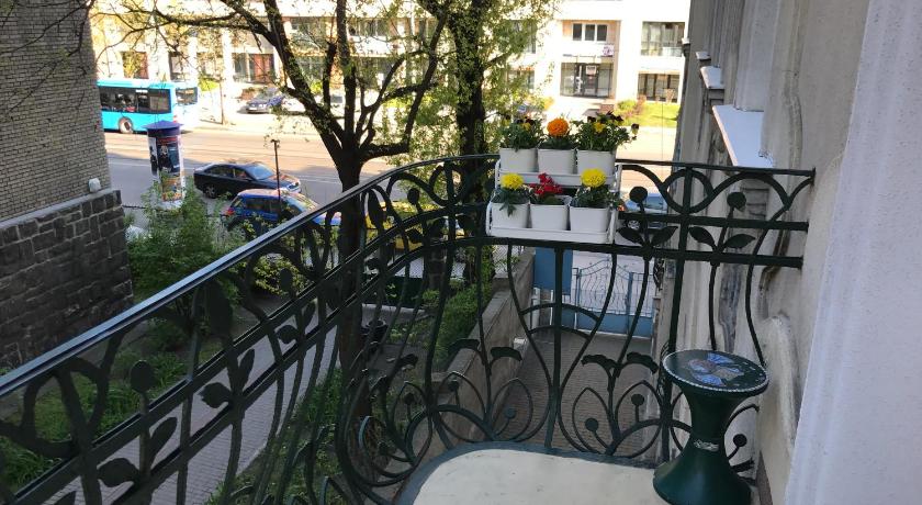a patio view of a balcony with a view of a garden, Szenes-House Apartman in Budapest