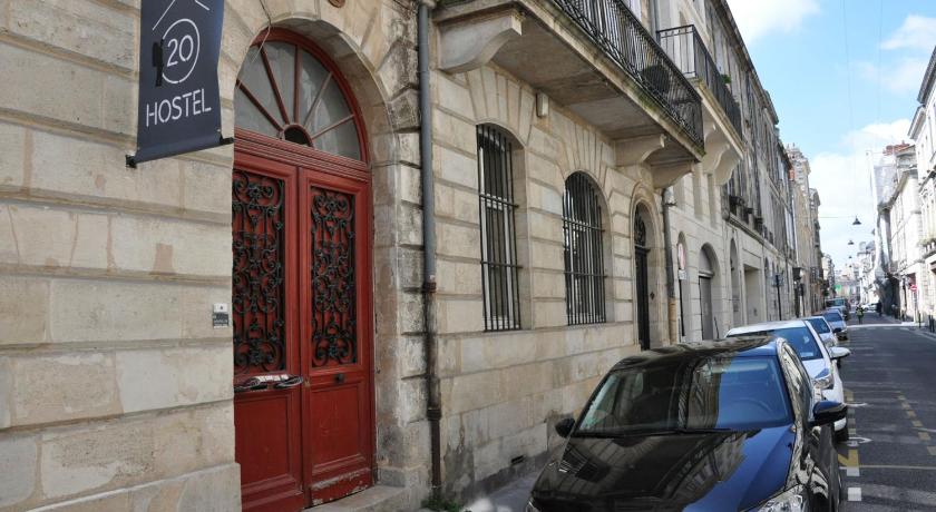 a car parked on the side of a street next to a building, HOSTEL20 Bordeaux HIFRANCE in Bordeaux