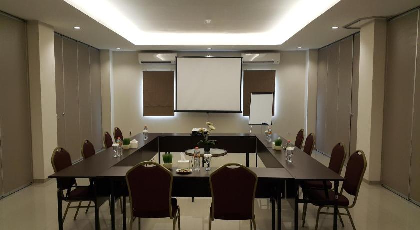 a large room with a large table and chairs, BiZ@ Hotel in Ambon