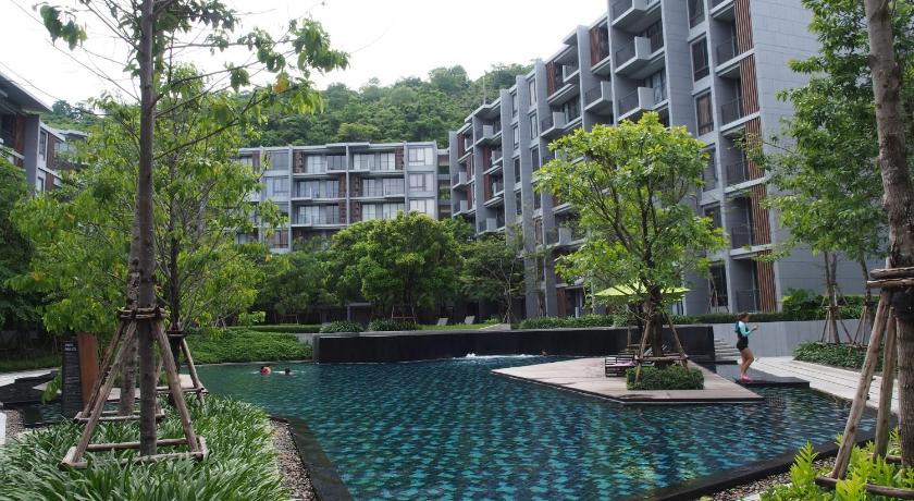 a large pool of water in front of a large building, Live your dream khao yai in Khao Yai